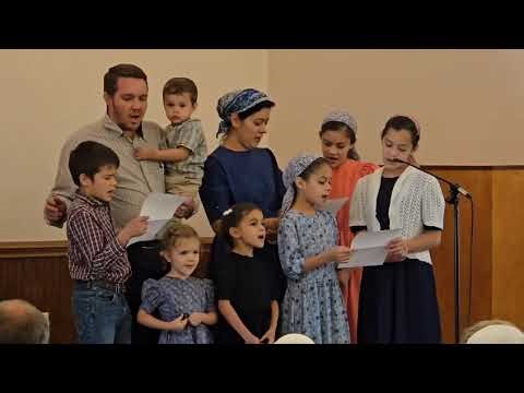 The Yoder family singing at DCF