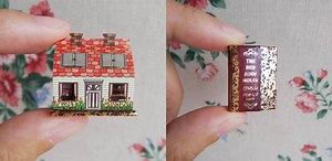 miniature pop-up books hold beds and staircases smaller than fingernails