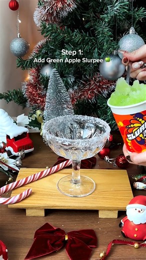 2.9K views | Even adults can indulge in Slurpee too! In the final episode, we are bringing back the nostalgia and making a Slushie Cocktail! This Green Apple Slurpee and Parrot Bay Strawberry Rum combo, topped with a candy cane, is the ultimate holiday drink. ✨  Create your own Christmas coolers with ingredients from 7-Eleven. Perfect for spreading cheer at home! ✨ | 7-Eleven Singapore | Facebook