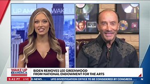 "It kinda hurt my feelings a little bit," said "God Bless the USA" singer Lee Greenwood on Monday's "Wake Up America" after being abruptly removed by President Joe Biden from the National Council on the Arts. | NEWSMAX