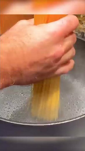 Nastya and Papa are preparing colored noodles.