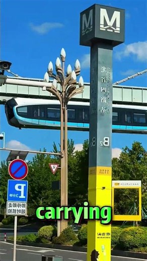 This train is hanging upside down on the bridge