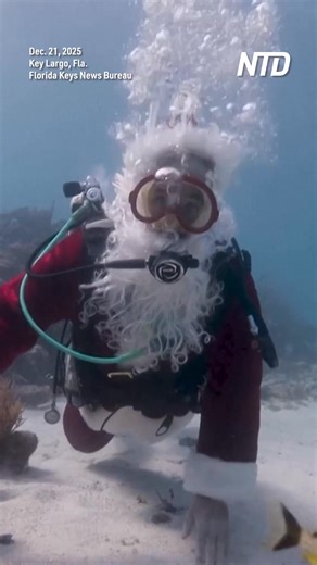 Santa Claus traded his sleigh for scuba gear on Sunday, making a holiday appearance beneath the waters of the Florida Keys National Marine Sanctuary. | NTD Television