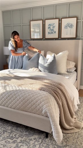 Meggie | Modern Organic Home Decor & Inspo on Instagram: "She wanted something modern and coastal, but still soft and timeless. So we mixed layered textures, muted blues, and warm neutrals to create her own little retreat. It’s coastal… but in the calm, elevated way that I love! 🤍🌊 P.s: her gorgeous queen upholstered bed (ivory canvas) it’s currently on sale for under $350 🎉 🔗Follow + Comment “BEDROOM” and I’ll DM you all the links! 🩵 Make sure you’re following me first so Instagram can del
