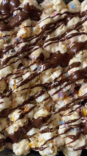 1K views · 14 reactions | These fun popcorn bars are quick, easy and made with only 6 ingredients! They are so whimsical and great for both children and adults. They are gooey, sweet, sticky, and delicious! The buttery marshmallow coating makes these bars so tasty. Great for an after school snack, movie night, birthday dessert, entertaining idea, or bake sale dessert! https://organicallyaddison.com/popcorn-bars/ | Organically Addison | Facebook