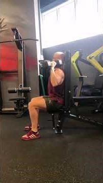 Жим гантелей сидя над головой