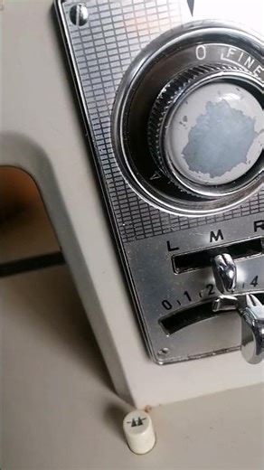 putting a button using a machine