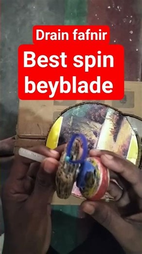 drain fafnir beyblade that is made by bottle cap
