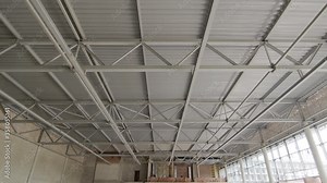 Ceiling of metal construction of a large modern room. Panorama of iron modern ceiling structures of a large restaurant. Stock Video