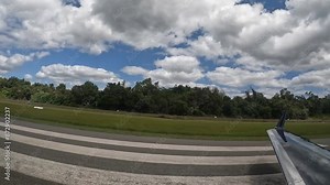 Experience the luxury of air travel with this stunning side-view footage from the window of a private jet during takeoff. Capture the thrill and elegance of a high-end aviation journey.