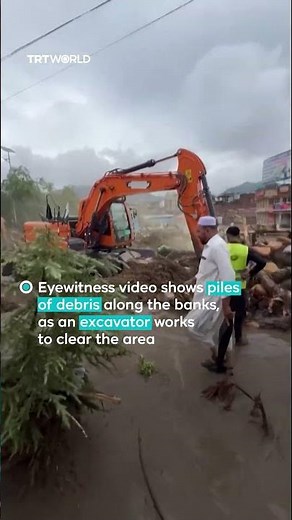 Floodwaters and debris surge through Pakistan's Mingora