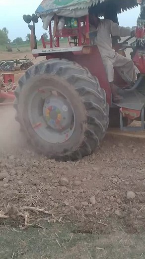 Plowing Field with Red Tractor: A Farming Showcase