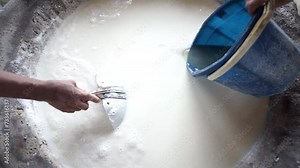 the process of mixing the tofu-making liquid. tofu manufacturing factory