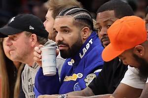 Drake Shows Off His Aaliyah Hat After Surprising Crowd At WWE Elimination Chamber