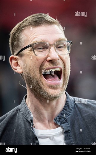 LEVERKUSEN, GERMANY - APRIL 22, 2026: World Champion 2014 Per Mertesacker laughing before the German DFB Cup semifinal match between Bayer 04 Leverkusen vs. FC Bayern Munich at BayArena on April 22, 2026 in Leverkusen, Germany. DFL REGULATIONS PROHIBIT ANY USE OF PHOTOGRAPHS AS IMAGE SEQUENCES AND/OR QUASI-VIDEO Stock Photo - Alamy