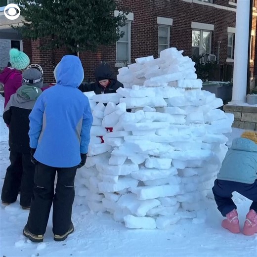 SNOW FORT: Kids were seen building a makeshift igloo with large ice blocks during a snow day in Memphis, Tennessee, on Monday (1/26). The area dodged the worst of the winter storm that hit many parts of the U.S., but children still got to enjoy a day of playing in the snow. | CBS Newspath
