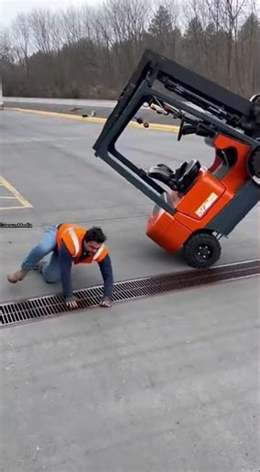Forklift Flips Off Dock, Driver Escapes by Inches 🚜💥