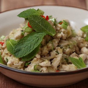 96K views · 2.3K reactions | You’ll ‘Laap’ up this Laos chicken dish topped with fresh mint! Full recipe in the comments. | Tastemade UK | Facebook