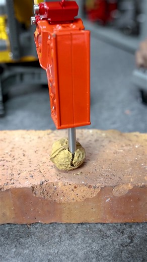 One hit with the hammer, and the walnut cracks open — the 1/50 5901 excavator model is here! 🥳​Comes with a hammer 🔨, not just for "construction"​It's also great at cracking walnuts! 🥜#remotecontrol #toucanhobby #scalemodel #originalcontent #rchobby #creativeengineering #creativefilm #RCmodel #model #custom #RCAddicts #customization #rc #controller #toucan #electric #rcexcavator #rcdigger #machine #rcmodel | Toucanhobby