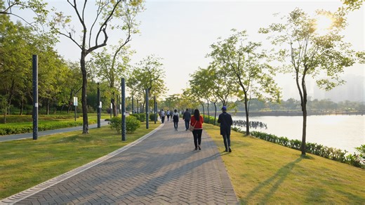 People gather and walk in this well designed public park