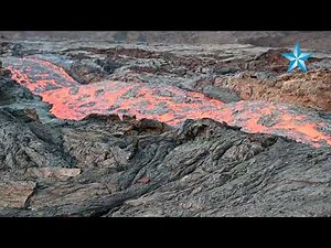 RAW: Lava from Mauna Loa eruption moves through channel
