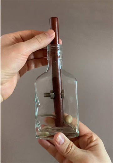 How can you get this wooden stick out off the bottle? Impossible bolt and magic trick and puzzle with a bottle and stick #puzzle #bottle #magic #trick #brainteaser