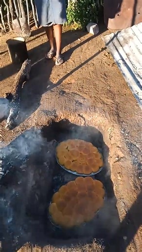 Village women always make plans. Here they are using a makeshift underground oven to bake scones. 🫓 | Kasi Hustlers