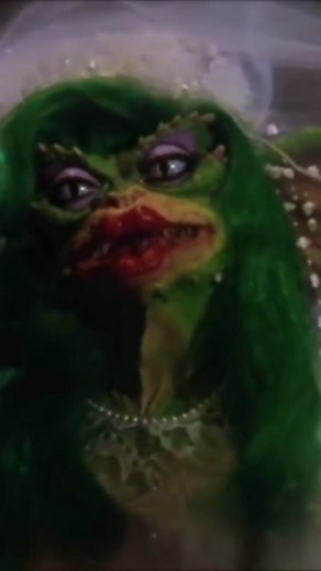 GangsterSaysRelax on Instagram: "Monday and getting things done like Greta Gremlin and Forster. Scene with Greta Gremlin and Robert Picardo in Gremlins 2: The New Batch, 1990. Do you have a special memory to this film? #gretagremlin #wedding #weddingdress #weddingphotography #gremlins #gremlins2"