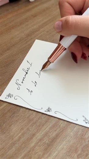 plan with inès | bullet journal inspo and drawing tutorials on Instagram: "don’t comment on my missing nail polish 😭 but seriously this was the nicest gift and I just happen to *love* fountain pens. and white. and rose gold. I think they really know me over at @ellington.pens 😂 if you love treating yourself to the finer things, they have so many beautiful pens and accoutrements (accessories) to go along with them. you can shop with my discount planwithines 💙 #stationery #fountainpen #statione