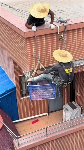 A clever way to transport materials to higher floors using a homemade pulley system.