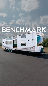 Introducing the Benchmark Luxury Destination Trailer by Alliance RV, our latest innovation designed for those who seek a premium destination camping experience. Benchmark sets a new standard in the destination trailer category, combining thoughtful design, best-in-class features, and customer-driven innovation. The debut floorplan, the Benchmark 44LFT, is designed to elevate comfort and convenience for seasonal living. It features two full bathrooms and lofts on both sides of the coach, ensuring