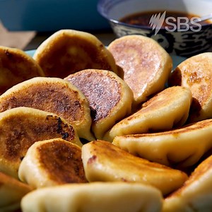 There's no denying that dumplings are the ultimate in comfort food and before you start thinking it's all too hard, remember many hands make light work - and this is a great recipe for a communal effort. #FromTheFoodVault http://bit.ly/porkandcabage | SBS Food