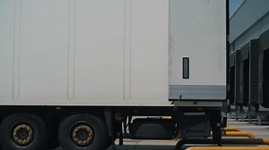 trucks dock with a logistics center