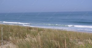 The beautiful coast at "le Cap Ferret" view from the top of the sand dunes. June 2023, France.