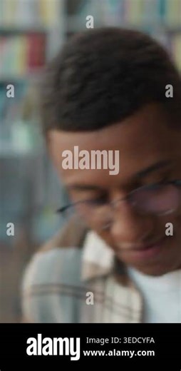 Clever student African American man come sitting typing laptop in university library male guy computer start work exam preparation elearning online books diploma session high school academy technology Stock Video Footage - Alamy