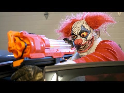 NERF War: Clown Claus!
