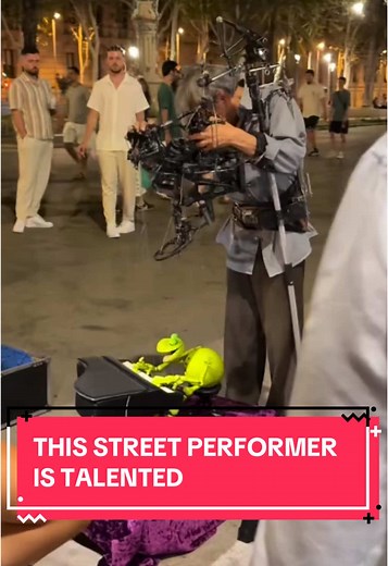 Street Performer Creates Magic with Frog Puppet and Piano