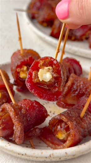 These will be a hit at your next party! Bacon Wrapped Dates! Comment “Recipe” and we’ll get you the link! | Rachel Cooks