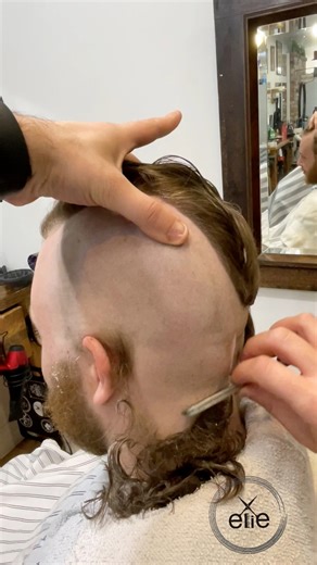 9.5K views · 51 reactions | "Elevating your style with the bold Mohawk and clean shave sides. Precision cuts for a standout look. Let's carve your unique hairstyle. Book now for a fresh transformation! #MohawkStyle #ShaveSide #shave #baldes #barberlife #fypシ #elliebazerli | Ellie bazerli | Facebook