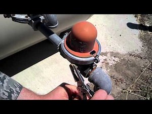 Resetting an earthquake valve on a propane tank 1