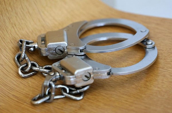 Rogers woman arrested on charges of rape, burglary