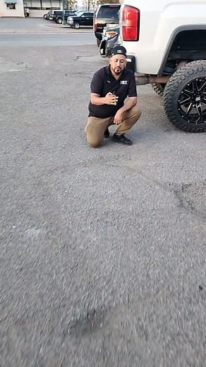 Key Fob Usage Demonstrated by Adult Male in Parking Lot