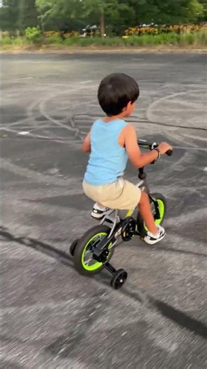 Little Champion! First Bike Ride with Training Wheels