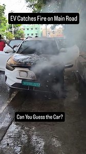 5.5K views · 31 reactions |  Shocking Scene in Vijayawada!  An electric car suddenly caught fire today while moving along the busy 100-Foot Road . Thankfully, everyone escaped in time —but this incident raises BIG questions about EV safety ⚡. What do you think? Are such EVs the future… or a ticking time bomb? ⏳ Drop your thoughts  #MGZSEV #Vijayawada #EVFire #BreakingNews #CarReels #EVIndia | Car Blog India | Facebook