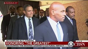 Actor Will Smith, former world heavyweight champion Lennox Lewis and others carry the casket of Muhammad Ali: http://cbsn.ws/1RZa97r | CBS News