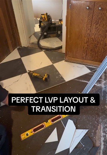 Started by removing the old glue-down laminate, then snapped a centerline to make sure the new LVP tile landed perfectly in the door openings. 👌 From there, it was all about matching the existing kitchen flooring for a seamless transition. The layout is what makes or breaks a flooring install. 🔥 #flooring #luxuryvinylplank #homerenovation #finishcarpentry #cordellcarpentry