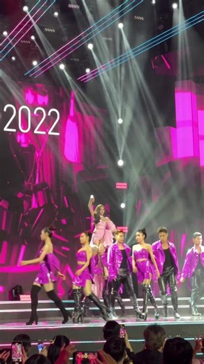 Vibrant Live Stage Performance with Stunning Costumes