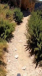 In Spain, Orbaneja del Castillo is a stunning medieval village in Burgos where a powerful karst spring bursts from a cave above the town, cascading in a series of turquoise waterfalls directly through the center of the stone houses before joining the Ebro River. #travel #spain | Spain Hidden Gems