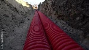 Footage of the trench with a long cable, laying cable, construction Stock Video