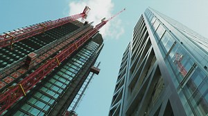 Two large buildings seen from below - Free Stock Video